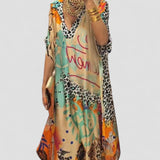 Miriam | Vestido com Padrão Leopardo Vibrante