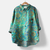 Petra ™ | Blusa floral de corte largo e elegante