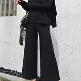 Conjunto de 2 Peças: Sweater com Fenda Lateral e Calças de Malha