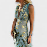 Vestido fluido com decote em V